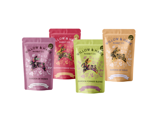 Four bags of Willow & Hare Rabbit Co. pet food on a white background